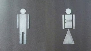 Two rectangular stick figures, one with legs, another with a triangle where the legs should be